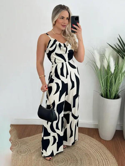 Black and white suspender jumpsuit with abstract pattern
