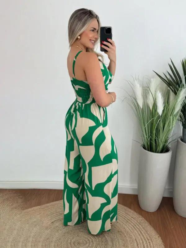 Side view of green and beige suspender jumpsuit