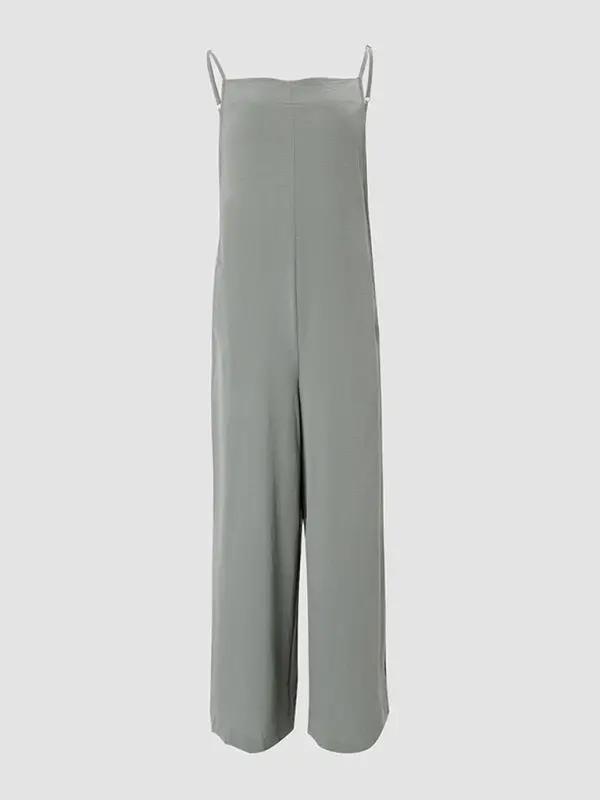 Front view of green wide leg suspender jumpsuit