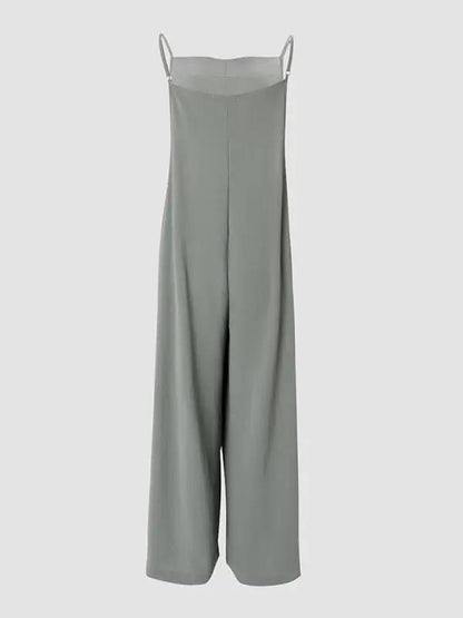 Back view of green wide leg suspender jumpsuit