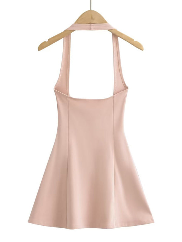 Pink halterneck high-waisted umbrella skirt on hanger