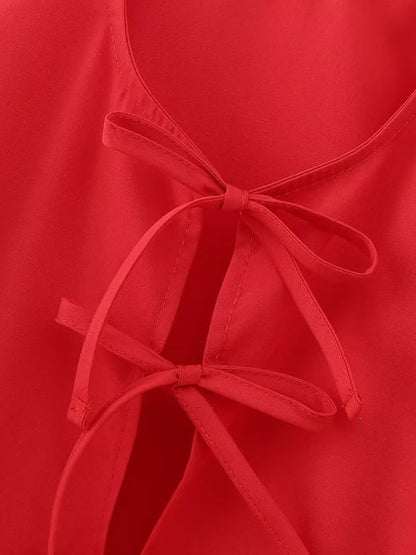 Red shirt top with strappy bow detail