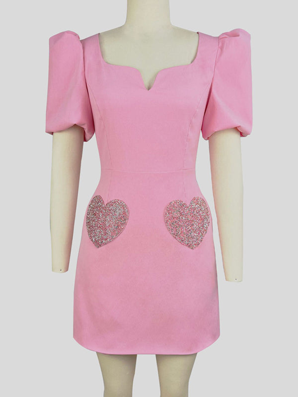 Sweet pink dress with puff sleeves and sequin hearts