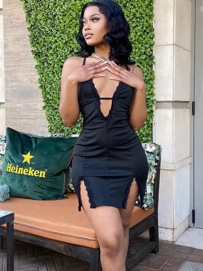 Model wearing black lace splicing slit hip dress, side view