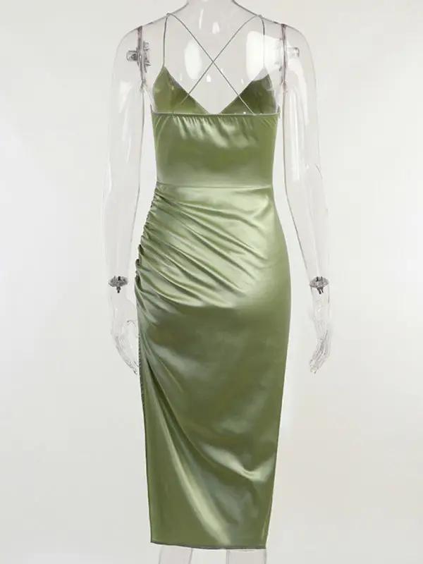 Back view of green suspender slit midi dress