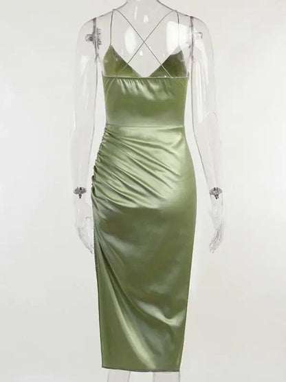 Back view of green suspender slit midi dress