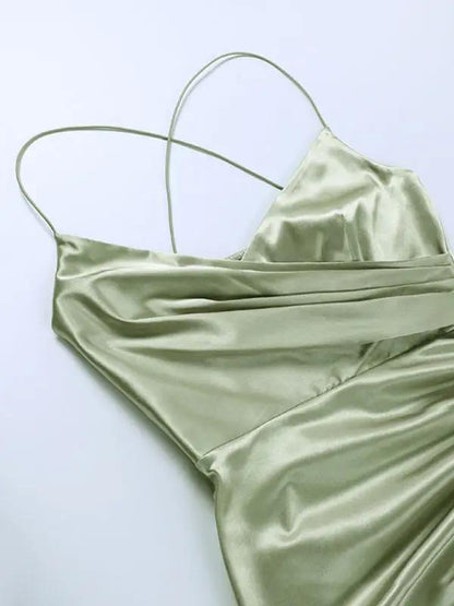 Green V-neck dress with pleated waist detail