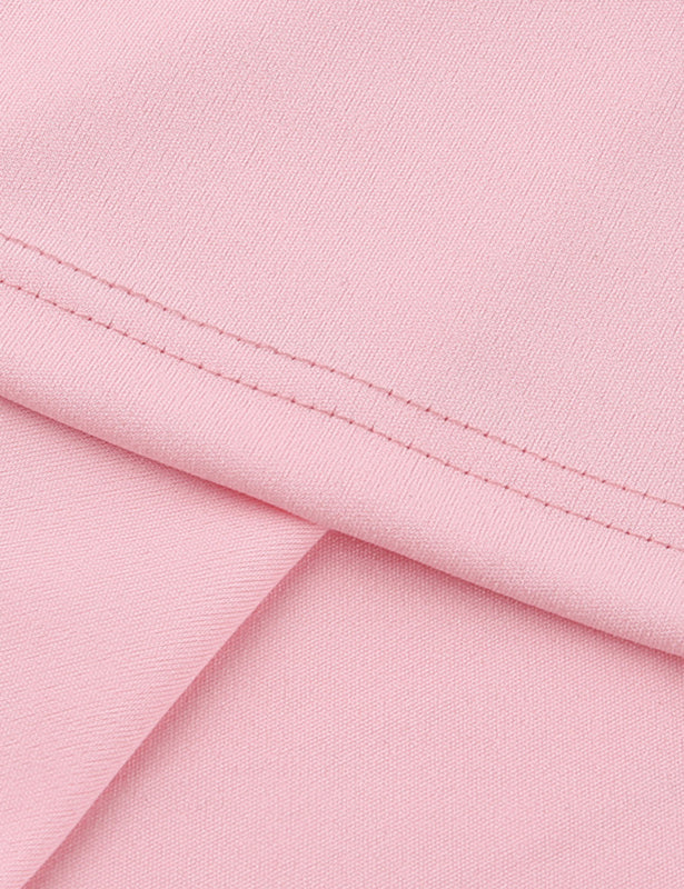 Close-up of pink dress fabric with stitching detail
