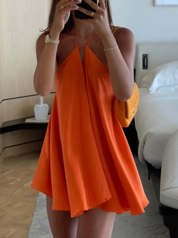 Orange deep V-neck backless A-line dress indoors