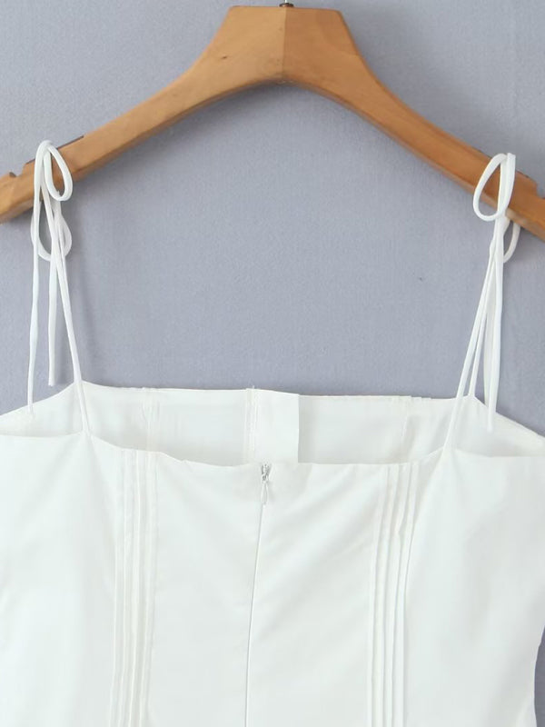 Back view of dress on hanger with tie straps
