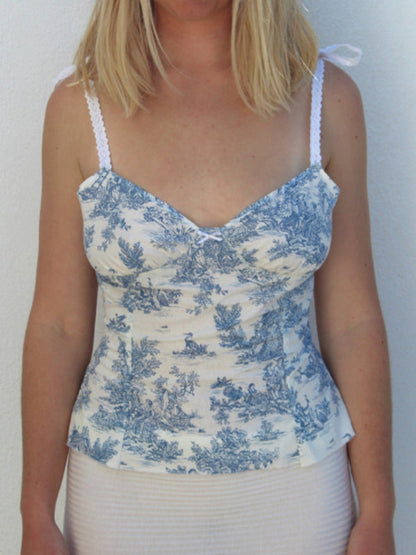 Blue patterned cami top with lace straps, front view