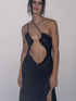 Close-up of black sexy hollow halter neck dress