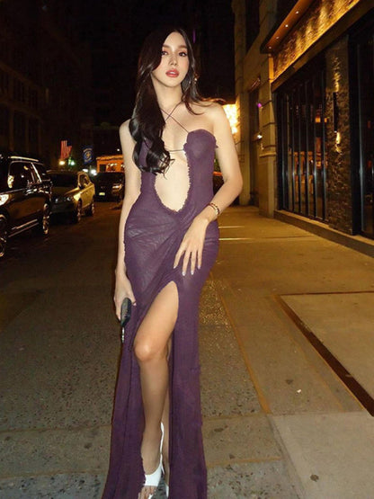 Model wearing purple sleeveless backless dress