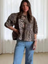 Leopard print puff sleeve shirt with lace-up detail