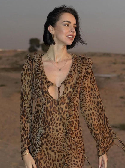 Leopard print dress with ruffled front slit, short hair model