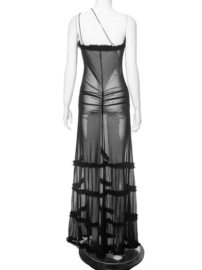 Back view of black lace slit dress on mannequin