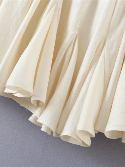Flowing pleats of strapless dress skirt