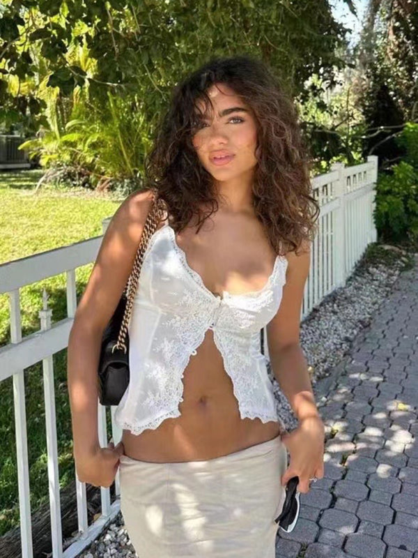 White lace satin camisole worn outdoors