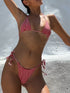 Red plaid strap bikini with holiday print, front view