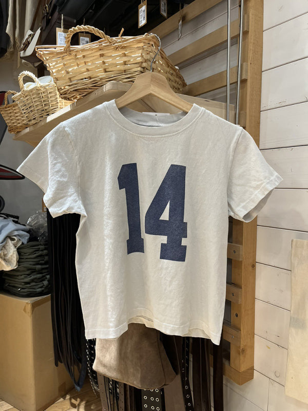 White retro distressed T-shirt with number 14 on hanger