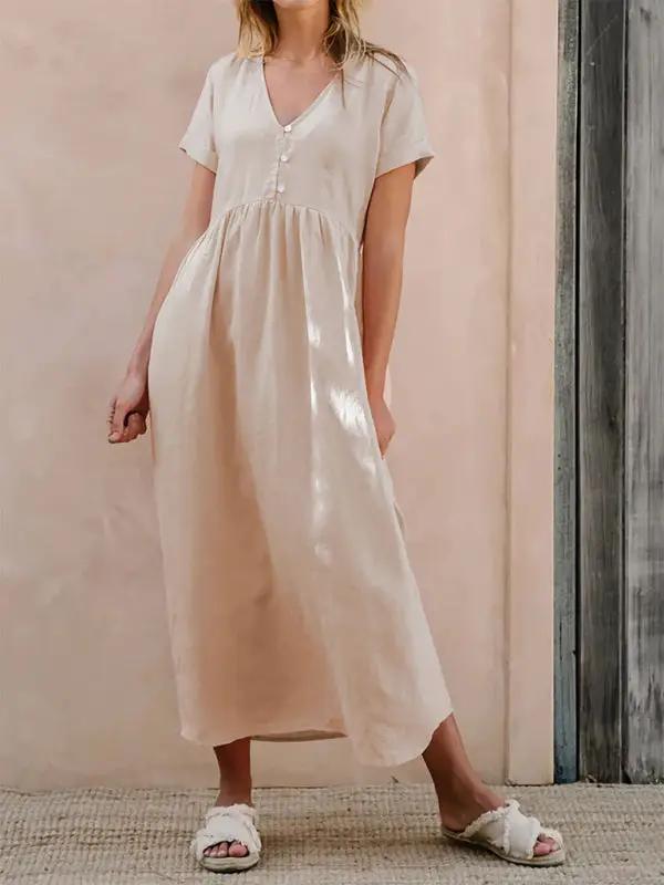 Elegant loose dress in solid color, front view