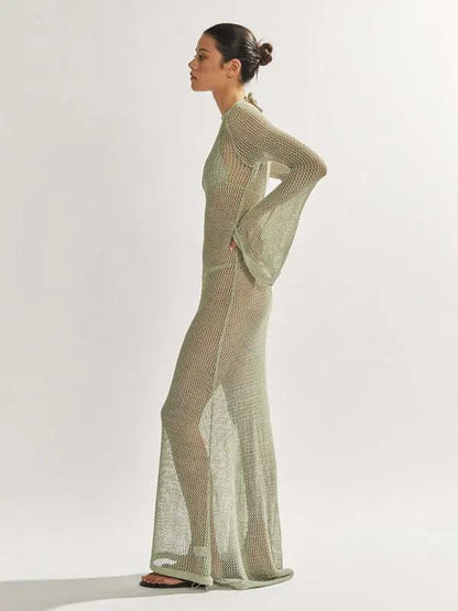 Side view of knitted see-through maxi dress, studio