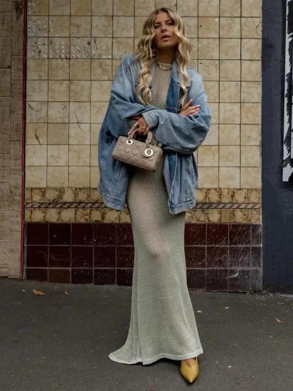 Knitted see-through maxi dress with denim jacket, street style