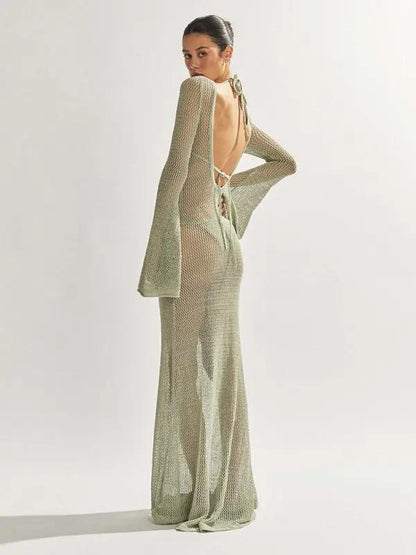 Back view of knitted see-through maxi dress, studio
