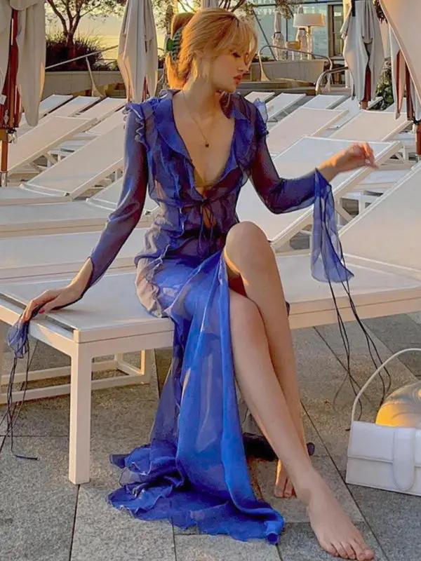 Blue see-through lace V-neck slit dress by pool