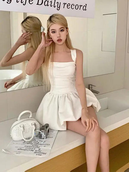 White dress sitting on counter, mirror reflection