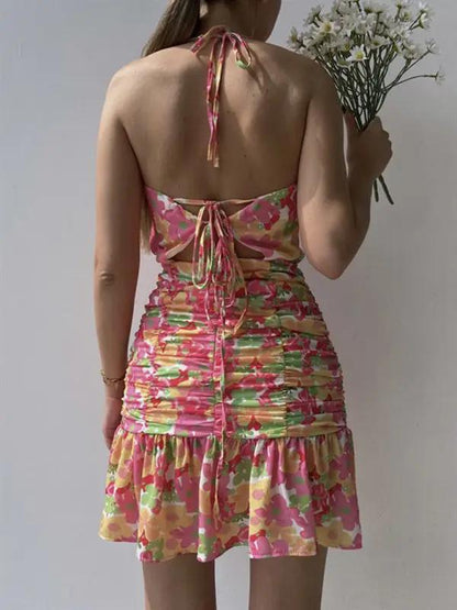 Back view of pink floral print dress with tie straps