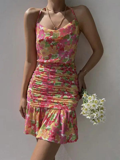 Floral print dress in pink with hip strap and ruched design
