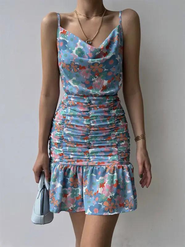Floral print dress in blue with hip strap and ruched design