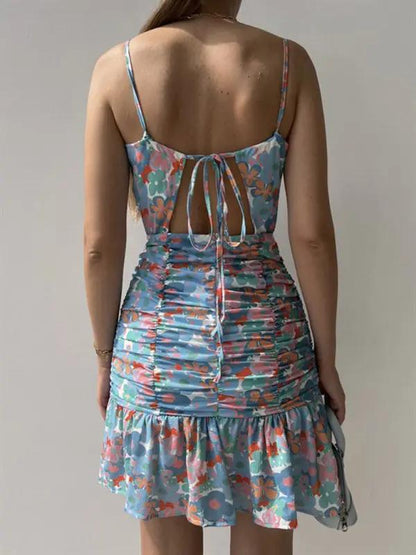 Back view of blue floral print dress with tie straps