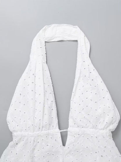 Top view of halterneck design on white dress