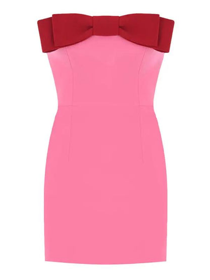 Front view of pink tube top dress with red bow