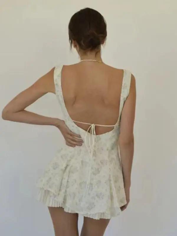 Floral hem pleated suspender dress, back view