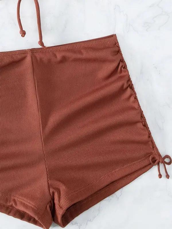 Close-up of brown split boxer briefs
