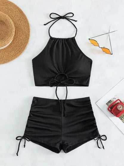 Black halter neck bikini with accessories