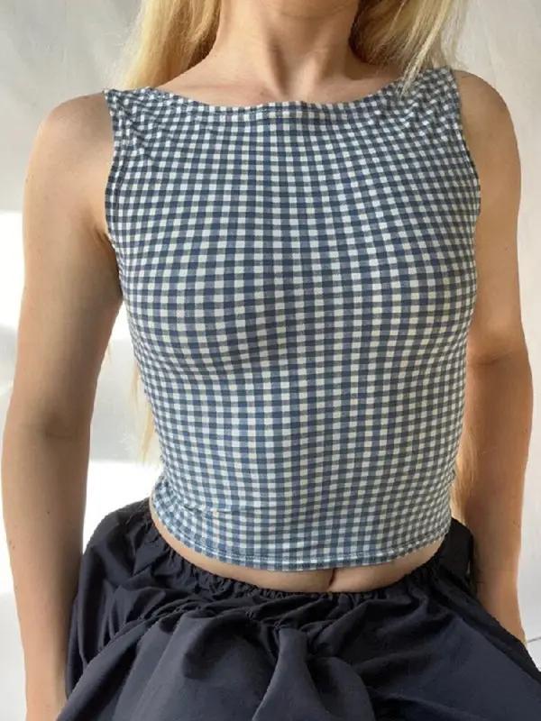 Front view of houndstooth slim vest with bow strap