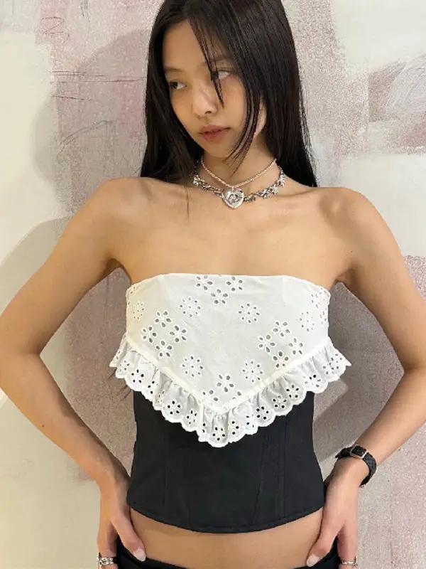 Model wearing crochet pattern tube top vest