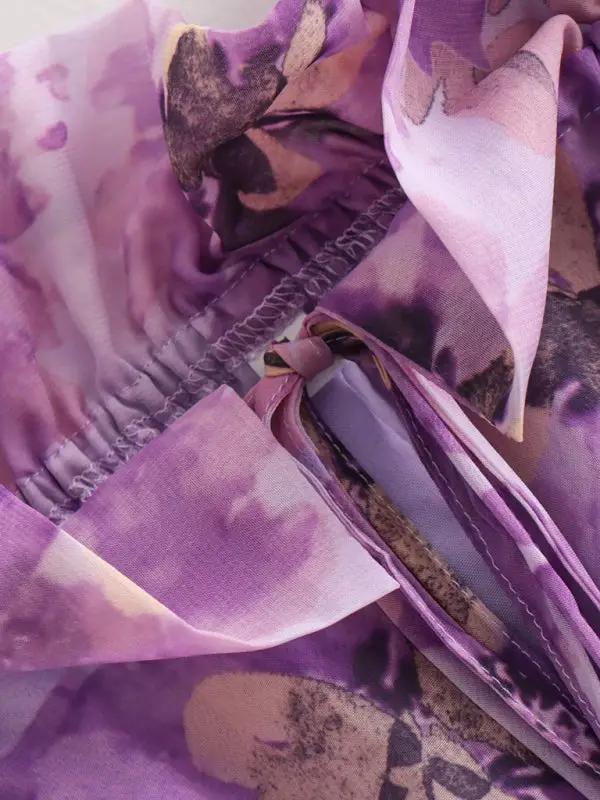 Close-up of purple flower shirt top fabric and stitching