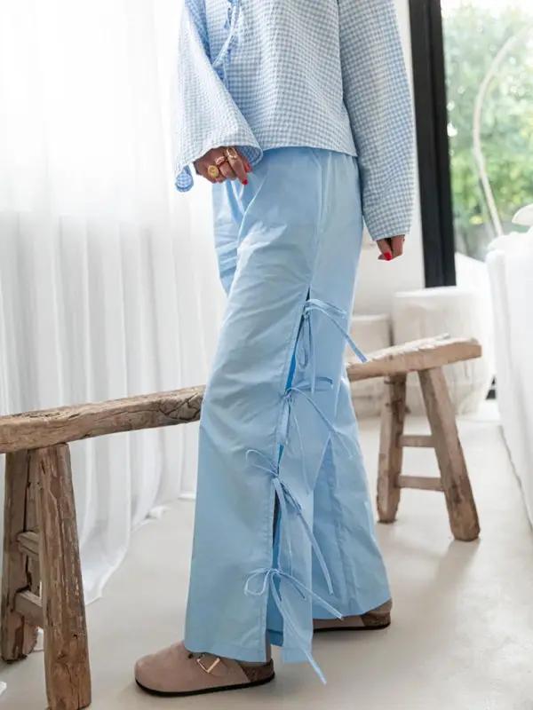 Blue strappy trousers with side ties
