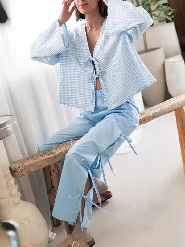 Casual blue plaid outfit with strappy trousers