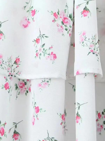 Floral pattern close-up on layered suspender dress