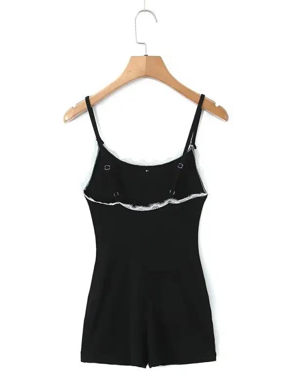 Black lace U-neck suspender jumpsuit back view on hanger