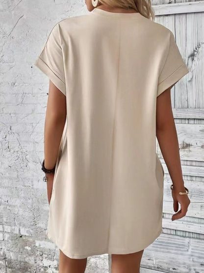 New spring and summer solid color round neck loose short sleeve pocket dress