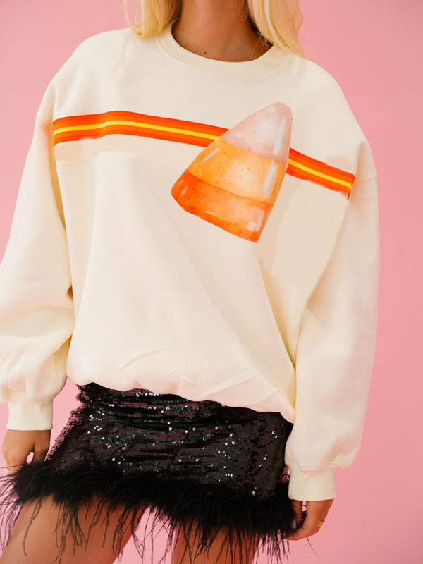 Cream sweatshirt with candy corn design, Halloween theme