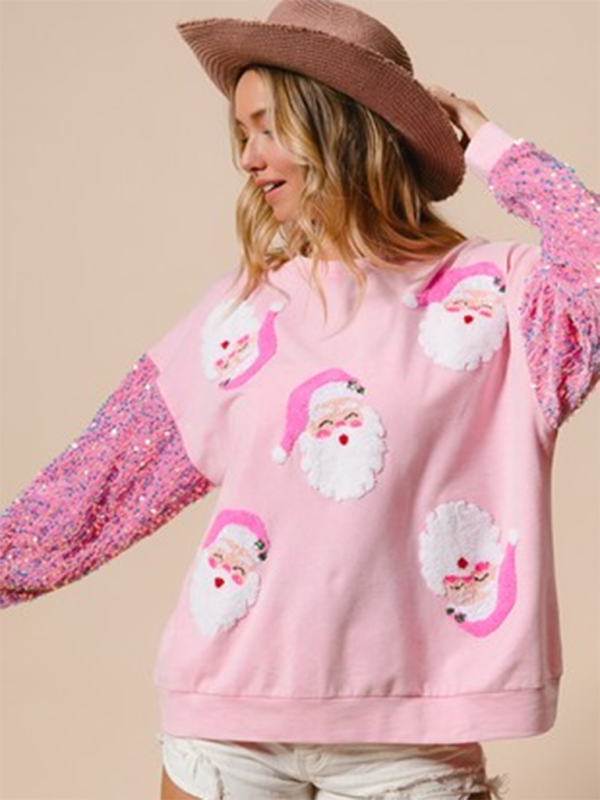 Pink Santa face sweater with sequin sleeves and hat