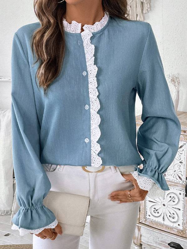 Model wearing blue lace cardigan shirt with white pants